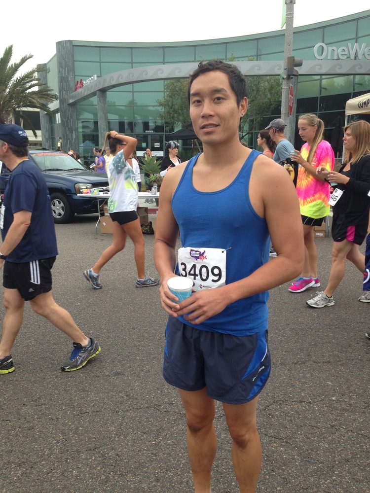 Robert Tew at a 5K race, wearing bib number 3409, ran in Huarache running sandals